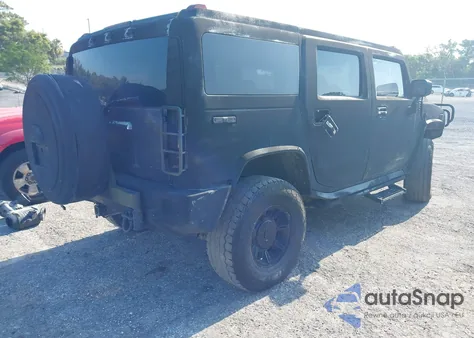 2003 Hummer H2 z USA, uszkodzony, nr VIN 5GRGN23UX3H140510